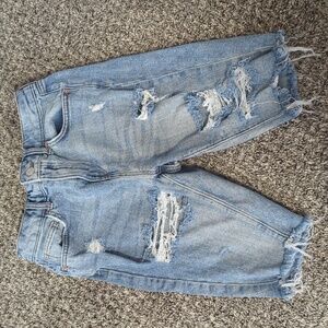 Light blue ripped jean shorts.